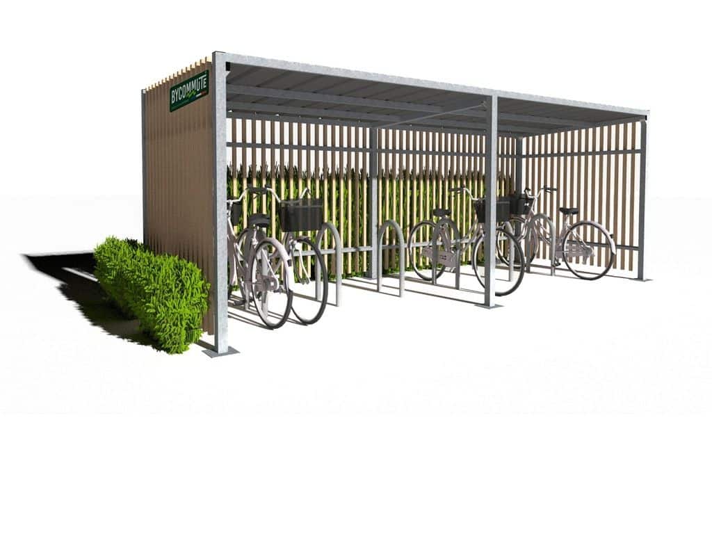 Abri vélo design avec structure métallique et parois en bois ajouré, conçu par Bycommute, avec vélos stationnés.