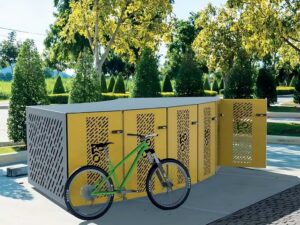 Box à vélos sécurisé ByCommute en acier galvanisé avec panneaux perforés, offrant une protection contre le vandalisme et les intempéries, idéal pour les collectivités et les entreprises